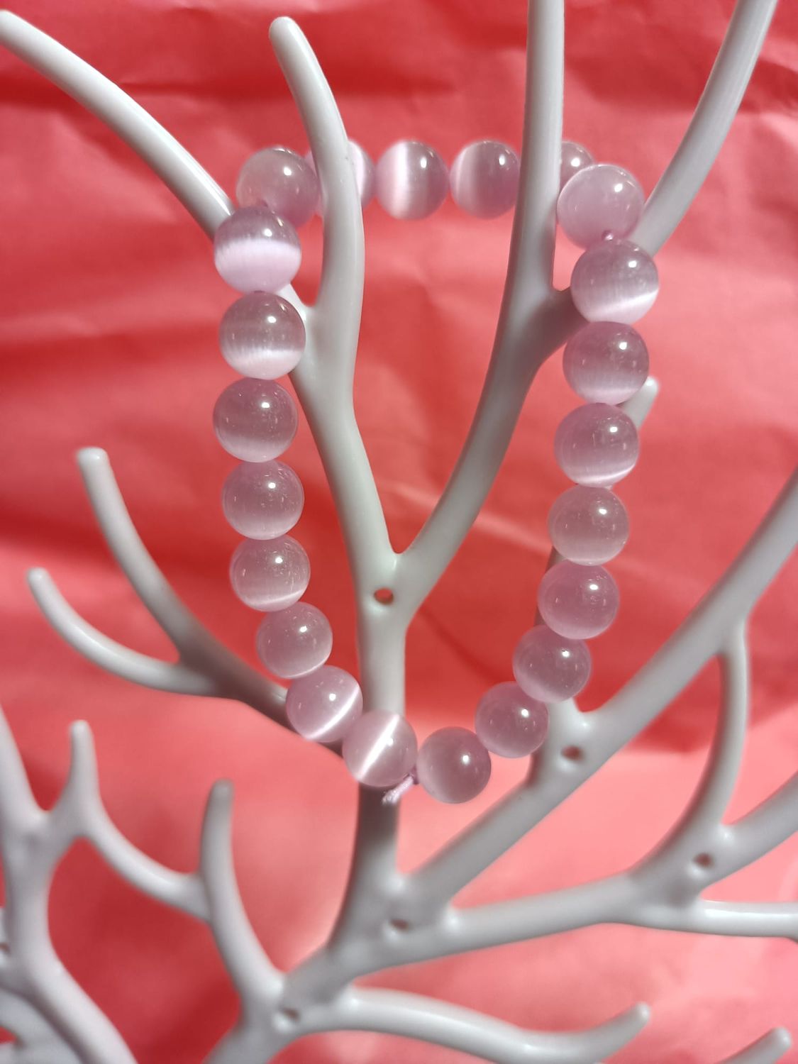 Pulsera de ojo de gato rosa