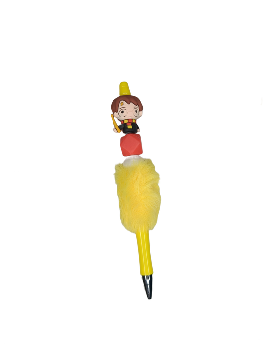 Bolígrafo con pelito amarillo