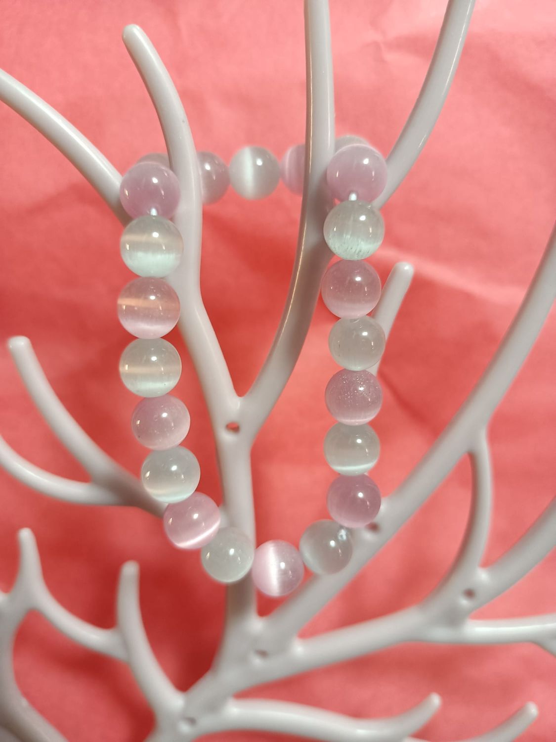 Pulsera de ojo de gato rosa y selenita